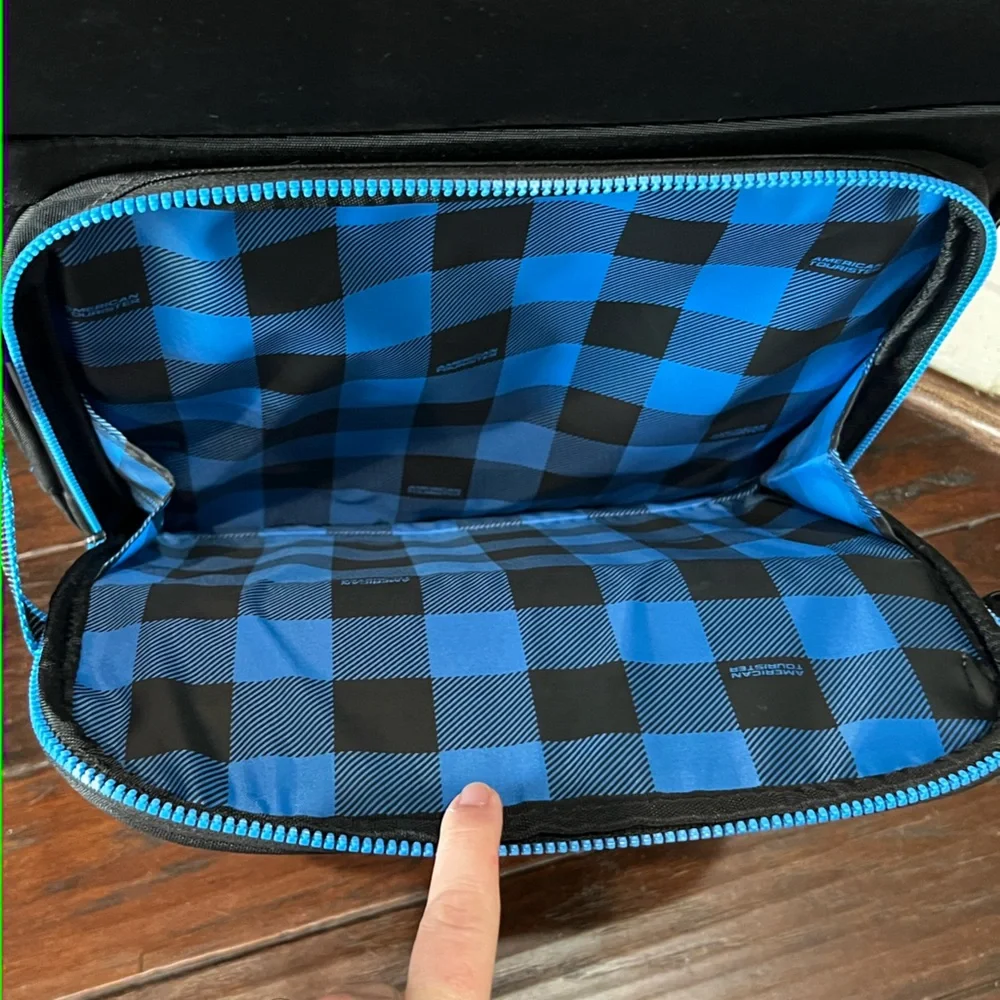 American Tourister Black and Blue Carry-On Spinner Suitcase